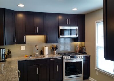 Brown Cabinetry in renovated kitchen